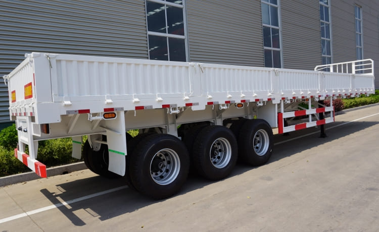 China 3 Axle Side Wall Flatbed Semi Trailer for Sale in Uganda